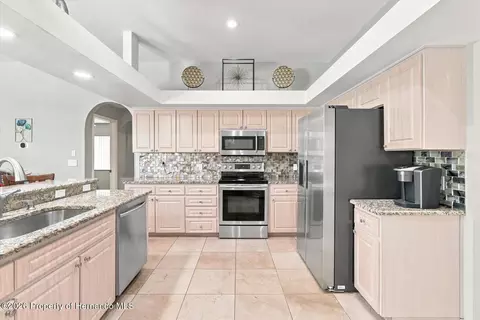 Kitchen - 3454 St Ives Blvd, Spring Hill, FL 34609 photo 2 of 4