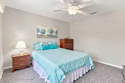 Bedroom - 3454 St Ives Blvd, Spring Hill, FL 34609 photo 6 of 7