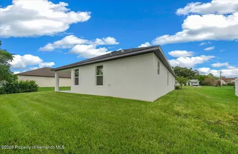 Exterior - 6589 Freeport Dr, Spring Hill, FL 34608 photo 4 of 7