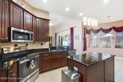 Kitchen - 13519 Barkingside Pl, Spring Hill, FL 34609 photo 6 of 7