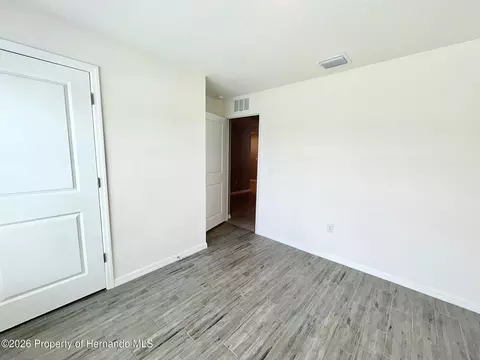 Bedroom - 4045 Montano Ave, Spring Hill, FL 34609 photo 2 of 3
