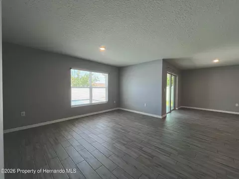 Living - 4045 Montano Ave, Spring Hill, FL 34609 photo 2 of 4