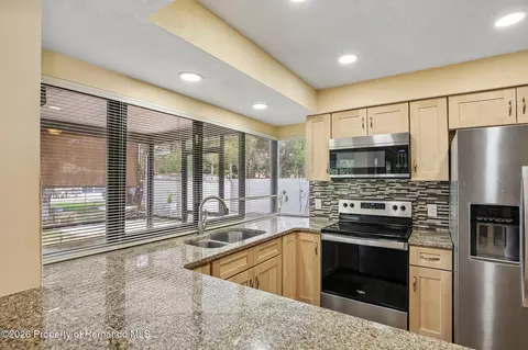 Kitchen - 3177 Maxwell Ave, Spring Hill, FL 34608 photo 2 of 3
