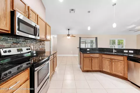 Kitchen - 2275 Fairview Rd, Spring Hill, FL 34609 photo 2 of 3