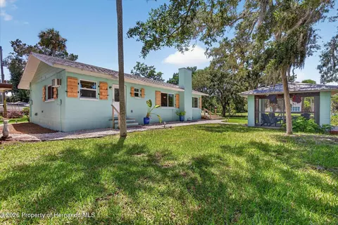 Exterior - 6086 Island Dr, Weeki Wachee, FL 34607 photo 12 of 16