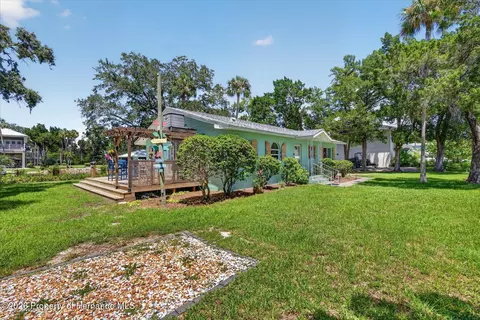 Exterior - 6086 Island Dr, Weeki Wachee, FL 34607 photo 7 of 16