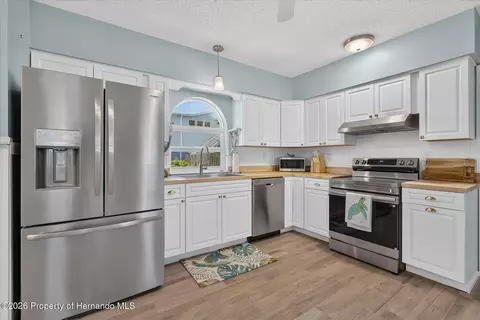 Kitchen - 6086 Island Dr, Weeki Wachee, FL 34607 photo 1 of 6