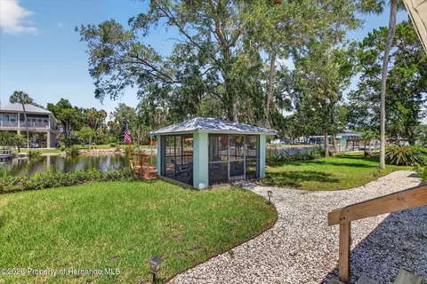 Exterior - 6086 Island Dr, Weeki Wachee, FL 34607 photo 2 of 16