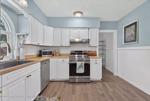 Kitchen - 6086 Island Dr, Weeki Wachee, FL 34607 photo 4 of 6