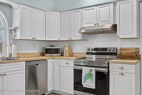 Kitchen - 6086 Island Dr, Weeki Wachee, FL 34607 photo 2 of 6