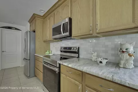 Kitchen - 2356 Rolling View Dr, Spring Hill, FL 34606 photo 4 of 5