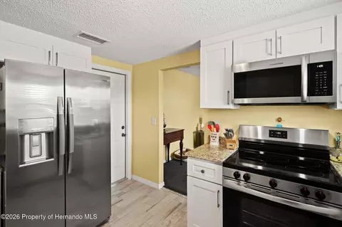 Kitchen - 4114 Orchid Dr, Hernando Beach, FL 34607 photo 4 of 4