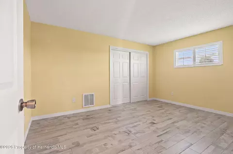 Bedroom - 4114 Orchid Dr, Hernando Beach, FL 34607 photo 7 of 8