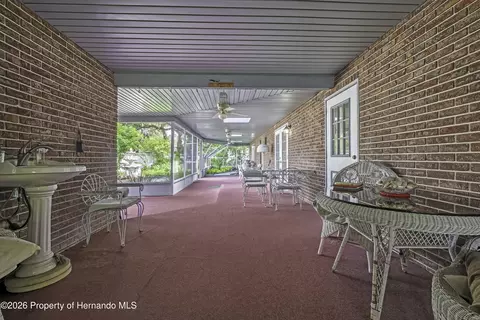 Exterior - 8150 Tranquil Dr, Spring Hill, FL 34606 photo 4 of 14