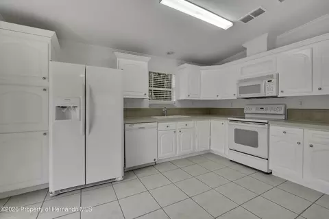 Kitchen - 5610 Ramada St, Weeki Wachee, FL 34607 photo 1 of 4