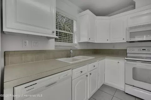 Kitchen - 5610 Ramada St, Weeki Wachee, FL 34607 photo 3 of 4