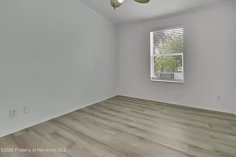 Bedroom - 5610 Ramada St, Weeki Wachee, FL 34607 photo 7 of 8