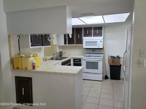 Kitchen - 404 Portland Ave, Spring Hill, FL 34606 photo 2 of 4