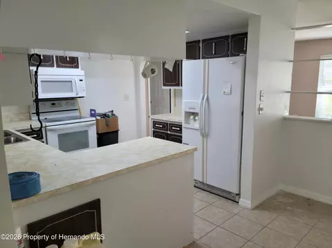 Kitchen - 404 Portland Ave, Spring Hill, FL 34606 photo 4 of 4