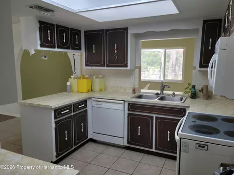 Kitchen - 404 Portland Ave, Spring Hill, FL 34606 photo 1 of 4
