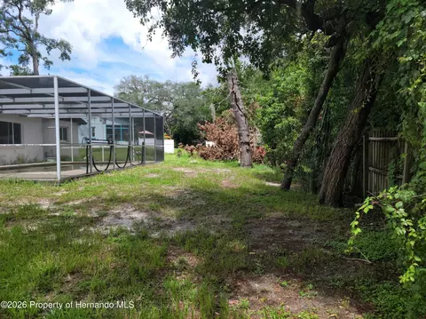 Exterior - 404 Portland Ave, Spring Hill, FL 34606 photo 5 of 6