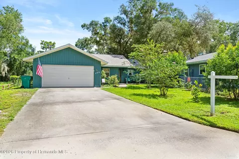Exterior - 406 E Circlewood St, Inverness, FL 34452 photo 2 of 11