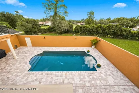 Exterior - 12384 Easthaven Dr, Spring Hill, FL 34609 photo 4 of 12