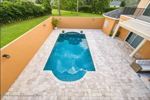 Exterior - 12384 Easthaven Dr, Spring Hill, FL 34609 photo 5 of 12