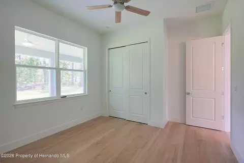 Bedroom - 17460 Macassar Rd, Weeki Wachee, FL 34614 photo 6 of 8