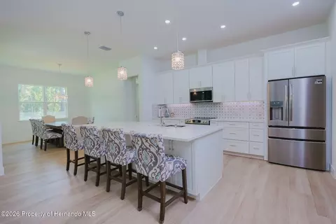 Kitchen - 17460 Macassar Rd, Weeki Wachee, FL 34614 photo 5 of 6