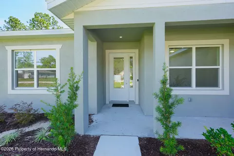 Exterior - 17460 Macassar Rd, Weeki Wachee, FL 34614 photo 1 of 7