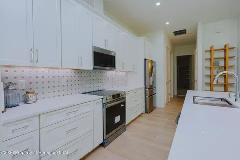 Kitchen - 17460 Macassar Rd, Weeki Wachee, FL 34614 photo 3 of 6