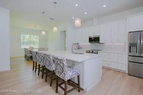 Kitchen - 17460 Macassar Rd, Weeki Wachee, FL 34614 photo 1 of 6