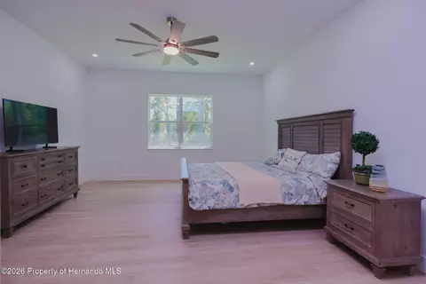 Bedroom - 17460 Macassar Rd, Weeki Wachee, FL 34614 photo 7 of 8