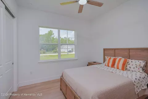Bedroom - 17460 Macassar Rd, Weeki Wachee, FL 34614 photo 8 of 8