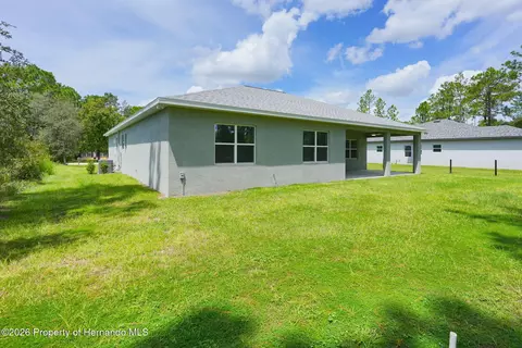 Exterior - 17460 Macassar Rd, Weeki Wachee, FL 34614 photo 5 of 7