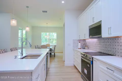 Kitchen - 17460 Macassar Rd, Weeki Wachee, FL 34614 photo 6 of 6