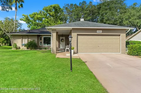 Exterior - 3121 Double Eagle Ct, Spring Hill, FL 34606 photo 3 of 10