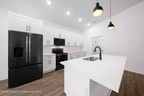 Kitchen - 10153 Lynnhaven Rd, Spring Hill, FL 34608 photo 2 of 2