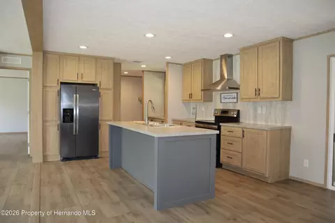 Kitchen - 6443 Finance Ave, Weeki Wachee, FL 34607 photo 1 of 3