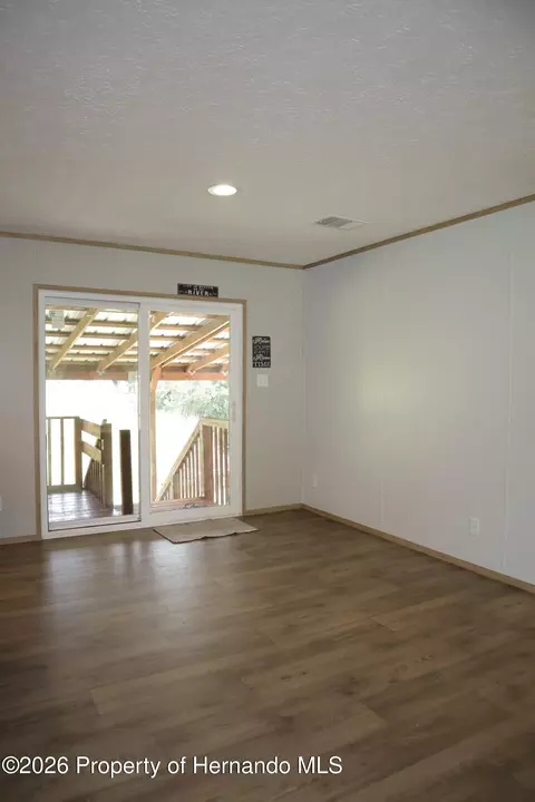 Living - 6443 Finance Ave, Weeki Wachee, FL 34607 photo 2 of 4