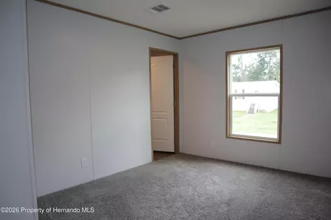 Bedroom - 6443 Finance Ave, Weeki Wachee, FL 34607 photo 6 of 7