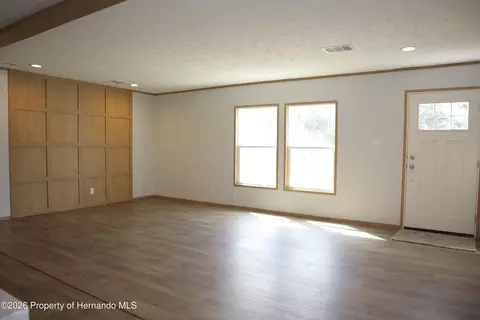 Living - 6443 Finance Ave, Weeki Wachee, FL 34607 photo 1 of 4