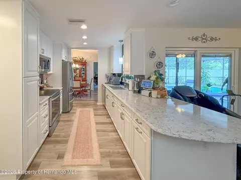 Kitchen - 11019 Captain Dr, Spring Hill, FL 34608 photo 2 of 2