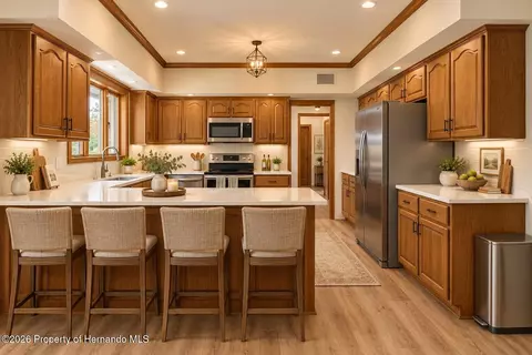 Kitchen - 10404 Sandtrap Dr, Spring Hill, FL 34608 photo 3 of 4