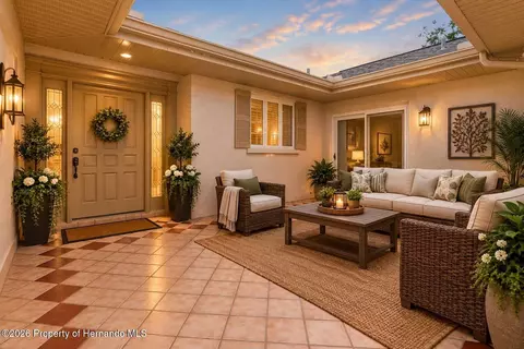 Exterior - 10404 Sandtrap Dr, Spring Hill, FL 34608 photo 5 of 9