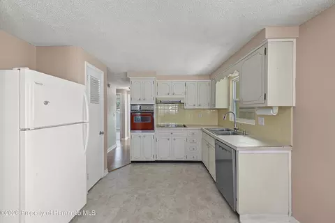 Kitchen - 4059 Sugarfoot Dr, Spring Hill, FL 34608 photo 1 of 2