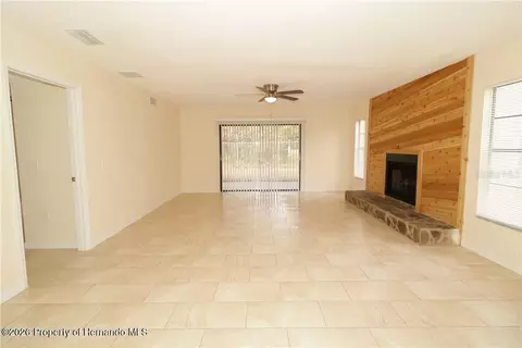 Living - 7851 Pinehurst Dr, Spring Hill, FL 34606 photo 2 of 2