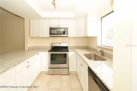 Kitchen - 7851 Pinehurst Dr, Spring Hill, FL 34606 photo 1 of 2
