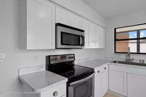 Kitchen - 12709 Skipper Ln, Hudson, FL 34669 photo 3 of 4